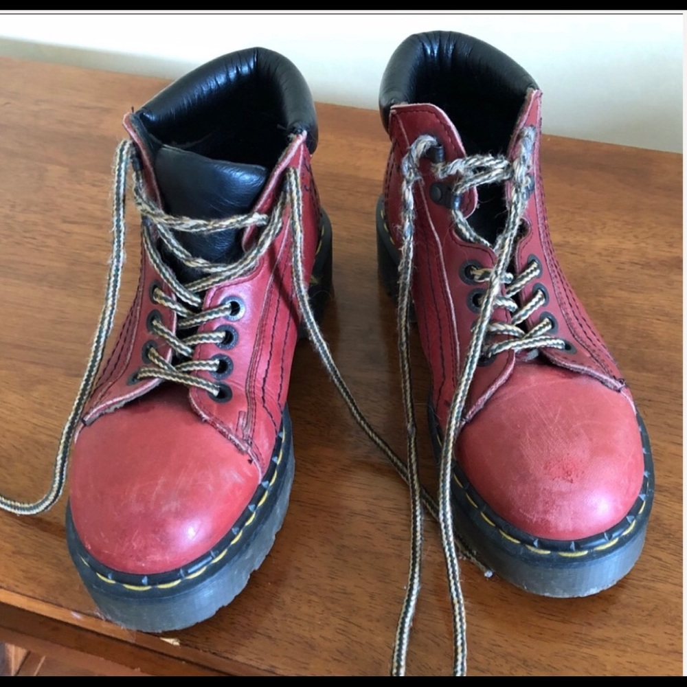 Doc Martens red boots.